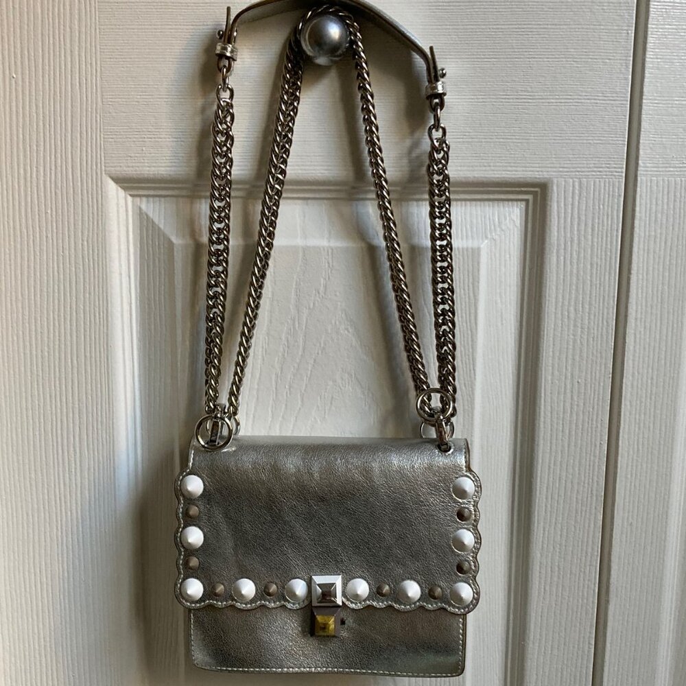 Studded metallic leather shoulder bag